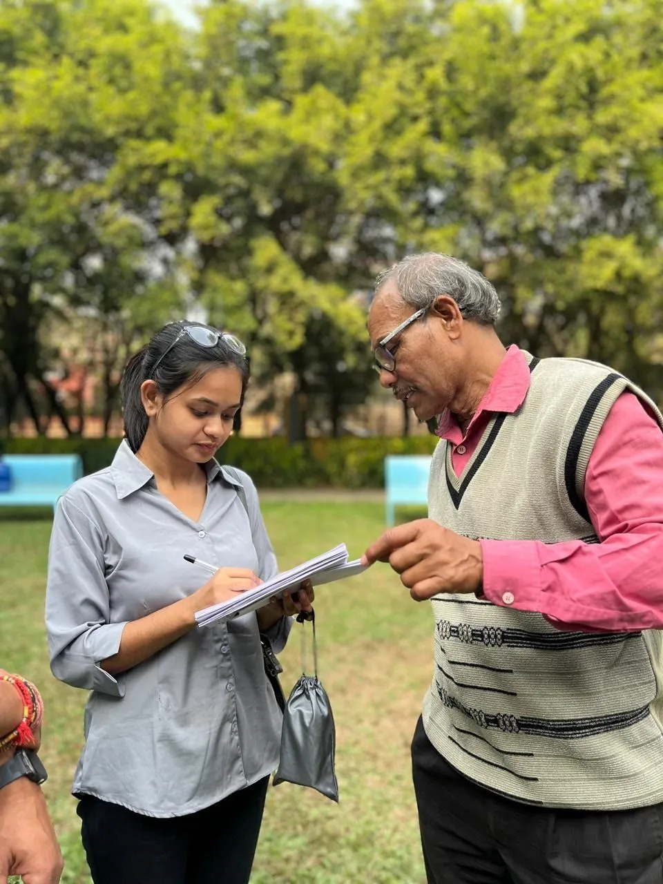 Volunteers registering blood donors outdoors