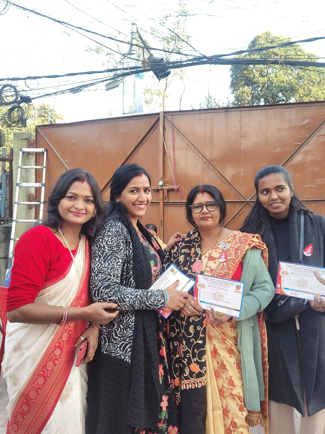 Volunteers preparing and serving food during a distribution round