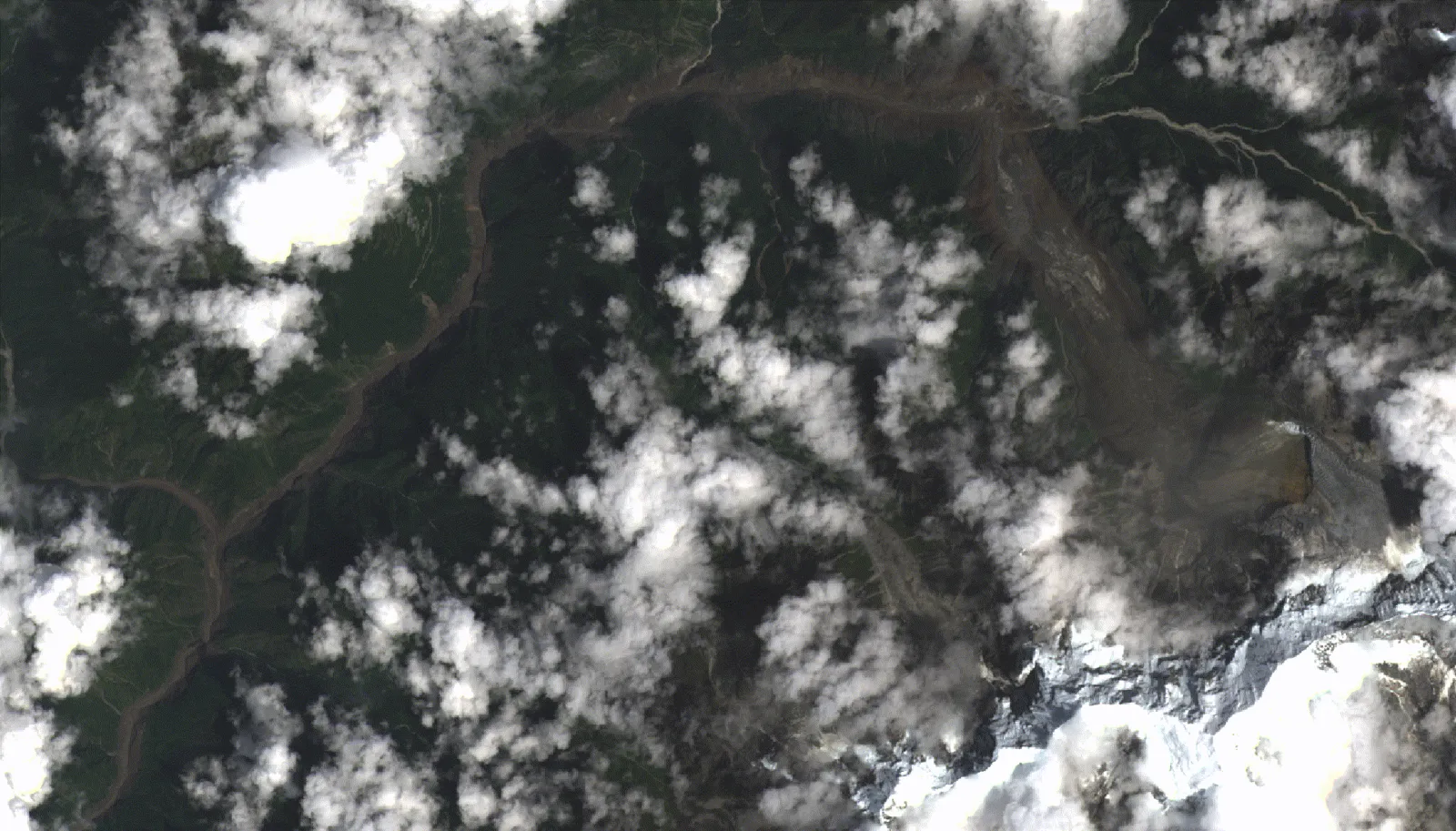 Landsat 9 satellite image of the Bhotekoshi and Trishuli valleys in Rasuwa, Nepal on 26 August 2026, showing a wide pale brown band of flood sediment along the valley floor where the river channel used to be narrow