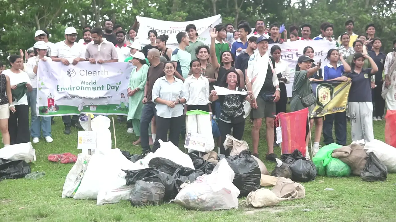 Volunteers with collected waste at Siliguri plogging event